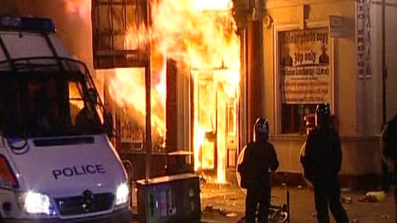 London riots - Petrol bombs were thrown at police