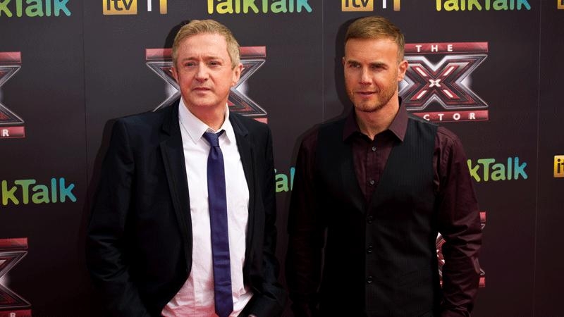 Louis Walsh: looking good beside fellow X Factor judge Gary Barlow