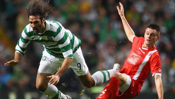 Georgios Samaras of Celtic is tackled by Michael Dingsdag of FC Sion
