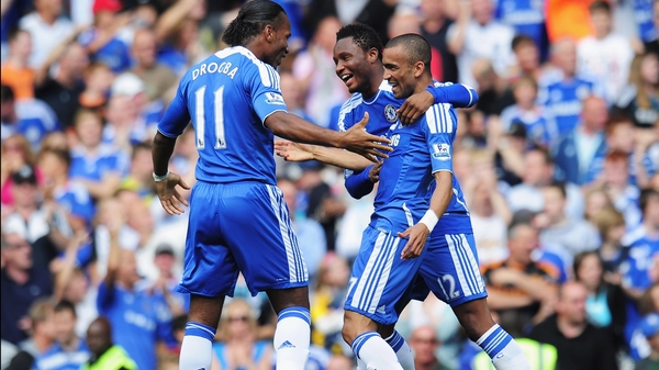 Jose Bosingwa - The Chelsea defender celebrates scoring against Norwich with team-mates Didier Drogba and John Obi Mikel