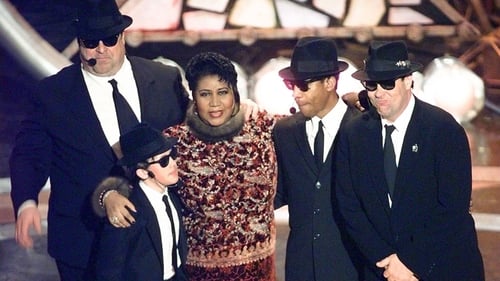 John Goodman, J. Evan Bonifant, Joe Morton and Dan Aykroyd as various brothers Blue with Aretha Franklin at the 1998 Grammys