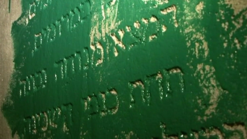 Green paint was poured over memorial