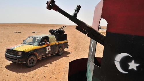 Rebels surrounding two towns loyal to Col Gaddafi