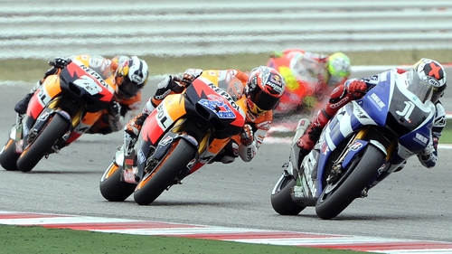 Spanish Yamaha rider Jorge Lorenzo (right) rides ahead of Australian Casey Stoner (centre) and compatriot Dani Pedrosa (left)