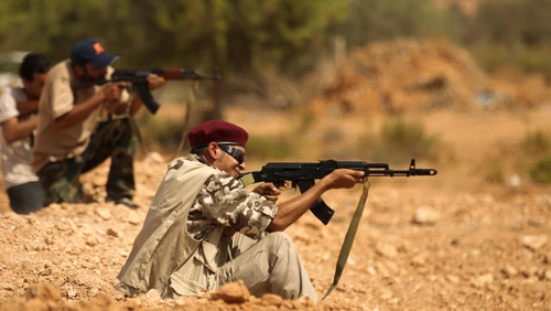 NTC fighters close in on Gaddafi base