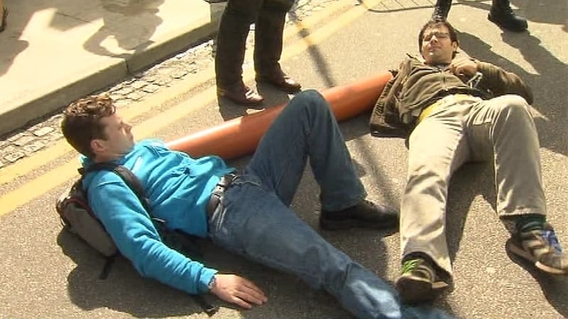 Two students tied themselves together outside the hotel in Galway