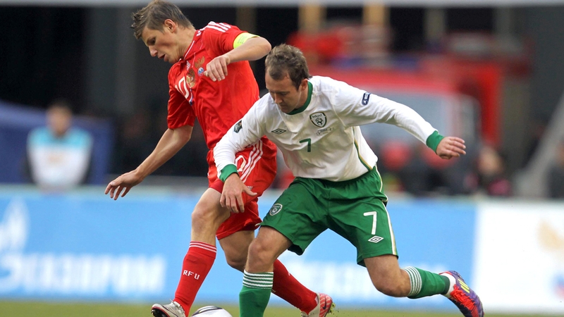 Under pressure - Aidan McGeady tracking back as Andre Arshavin breaks for Russia