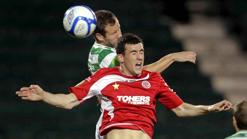 Shamrock Rovers' Pat Sullivan gets up ahead of Aaron Greene
