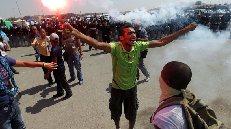 A protestor outside Hosni Mubarak's trial in Cairo