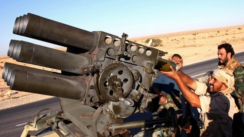 NTC forces load their weapons as they prepare for the battle of Bani Walid