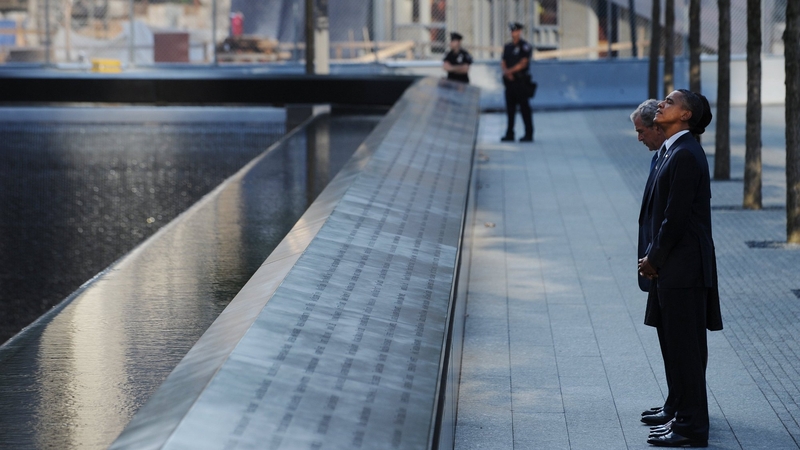 US President Barack Obama and First Lady Michelle Obama visit the North Memorial Pond
