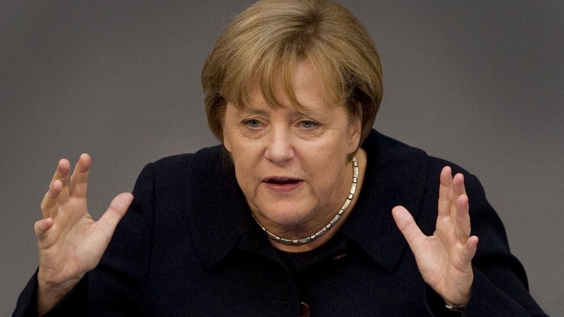 Angela Merkel before the German parliament's powerful budget committee today