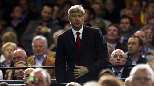 Gunners boss Arsene Wenger cut a lonely figure at Signal Iduna Park