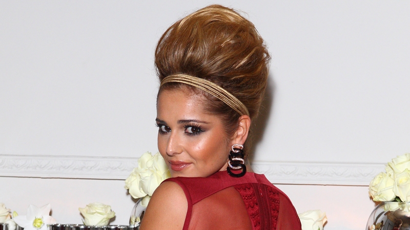 Cole reveals she's in a "happy" place now