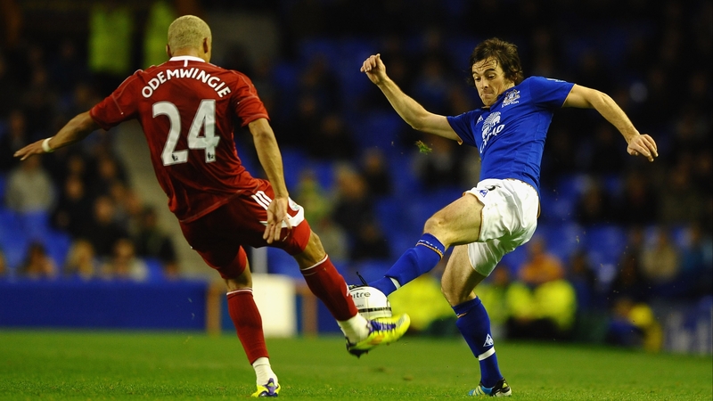 50-50 ball - Everton's Leighton Baines and Peter Odemwingie of WBA challenge for posession