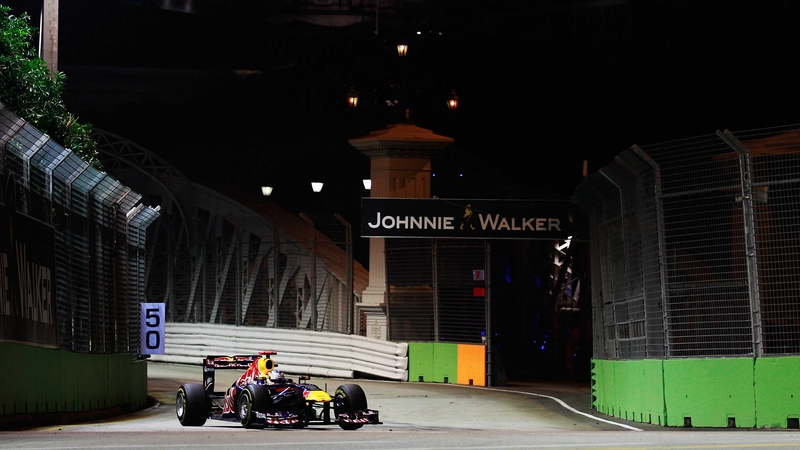 Sebastien Vettel moved to within a point of back-to-back world titles with a faultless display in Singapore