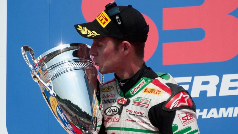 Jonathan Rea celebrates victory in the opening race at Imola
