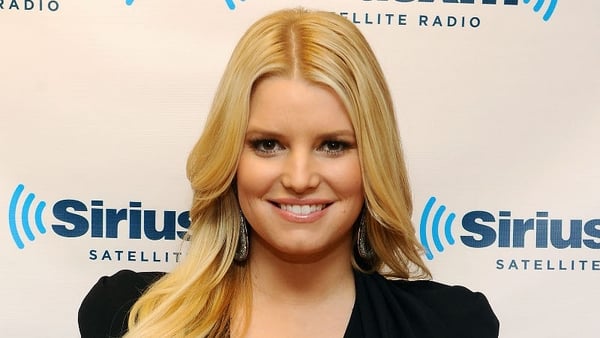 Simpson takes to her website to announce the news of her pregnancy