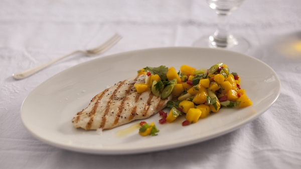Pan-fried chicken with mango salsa