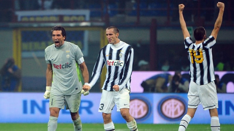 Juve players celebrate victory in a highly charged Serie A encounter