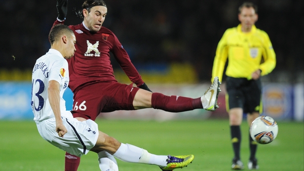 Tottenham's Ryan Fredericks gets a pass away despite the attentions of Bebras Natcho