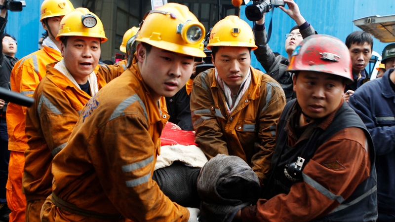 A miner is carried out on a stretcher