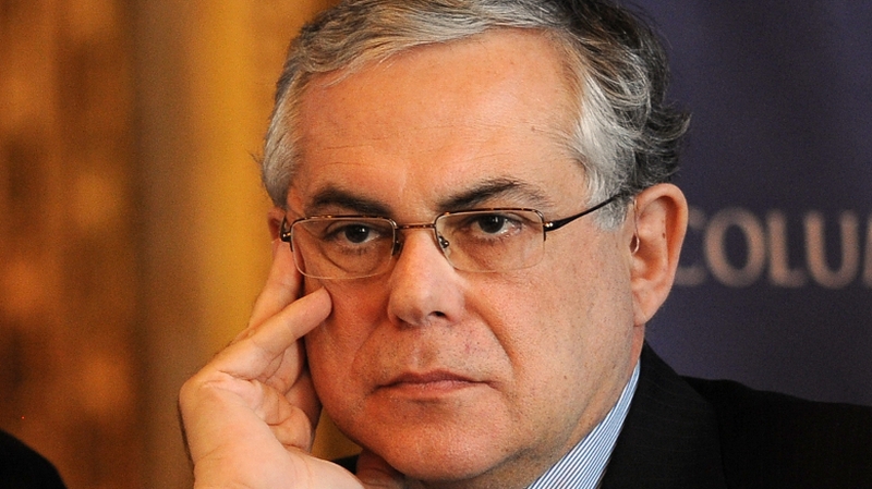 Lucas Papademos pressed on written reform pledges