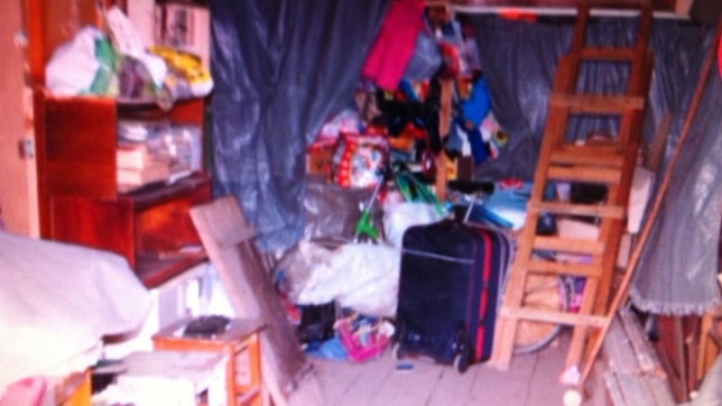 The image of inside the man's apartment comes from shaky police footage