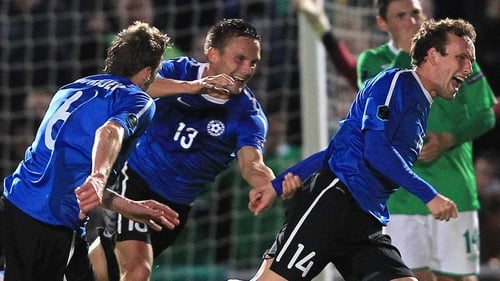 Konstantin Vassiljev (right) celebrates with team-mates Martin Vunk (centre) and Aleksandr Dmitrijev (left) after scoring against Northern Ireland
