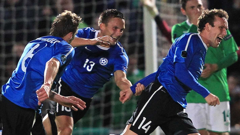 Konstantin Vassiljev (right) celebrates with team-mates Martin Vunk (centre) and Aleksandr Dmitrijev (left) after scoring against Northern Ireland