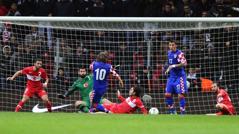 Luka Modric - Has a crack at goal for Croatia