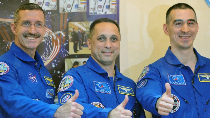 Dan Burbank, Anton Shkaplerov and Anatoly Ivanishin before they launched off
