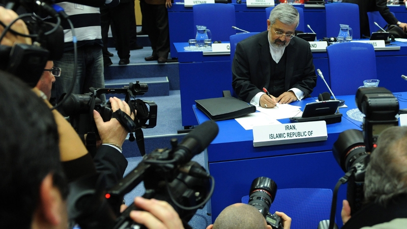The Iranian ambassador to the IAEA Ali Asghar Soltanieh reviews documents