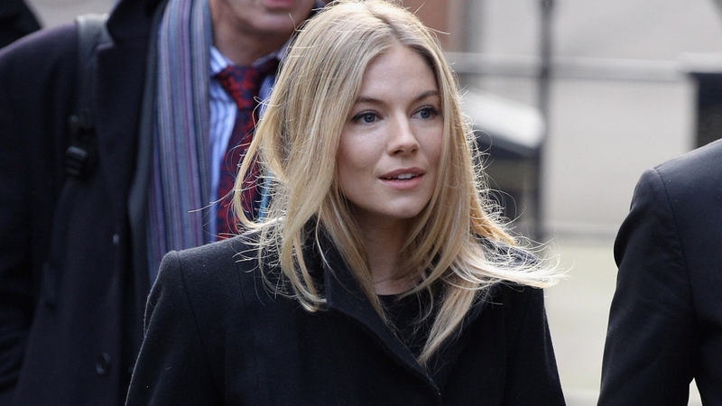Sienna Miller said she had been placed under a "web of surveillance"