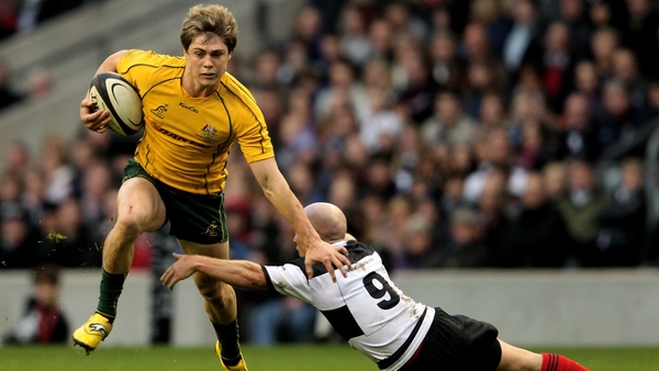 Easy for Australia - James O'Connor hands off Peter Stringer