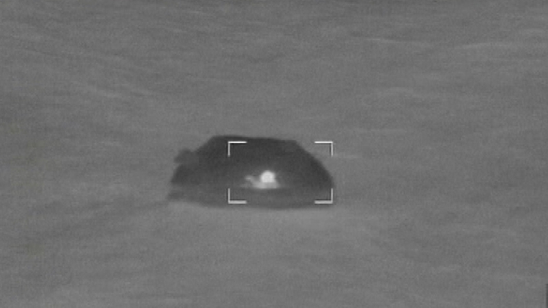 Two crew members were taken from the water around two hours after the alarm was raised