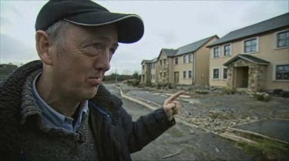 Dr Chris Sparks visitng a ghost estate.