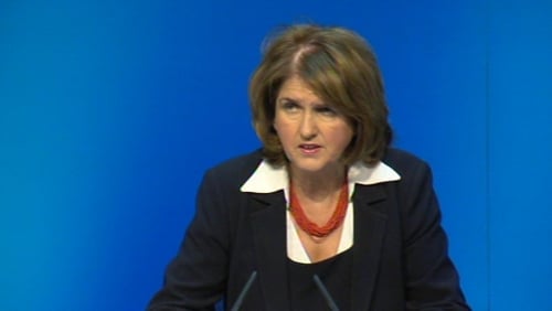 Joan Burton wants clarification of how the settlement was reached