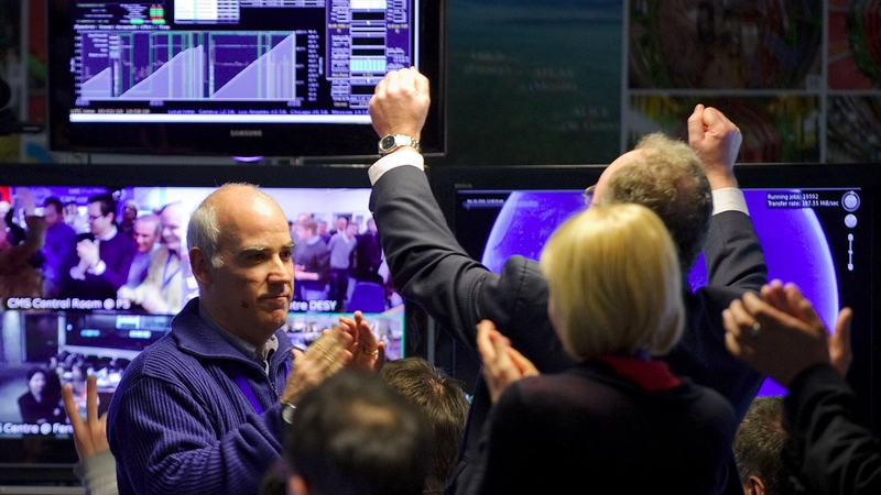 Scientists say they have found signs of Higgs boson