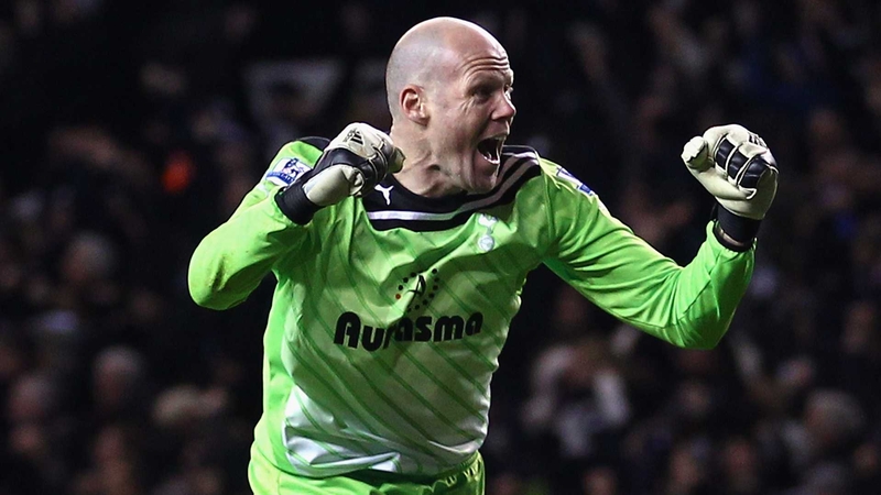Tottenham goalkeeper Brad Friedel celebrates after Roman Pavlyuchenko scored
