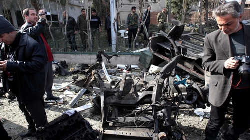 Two car bombings outside security buildings in Damascus