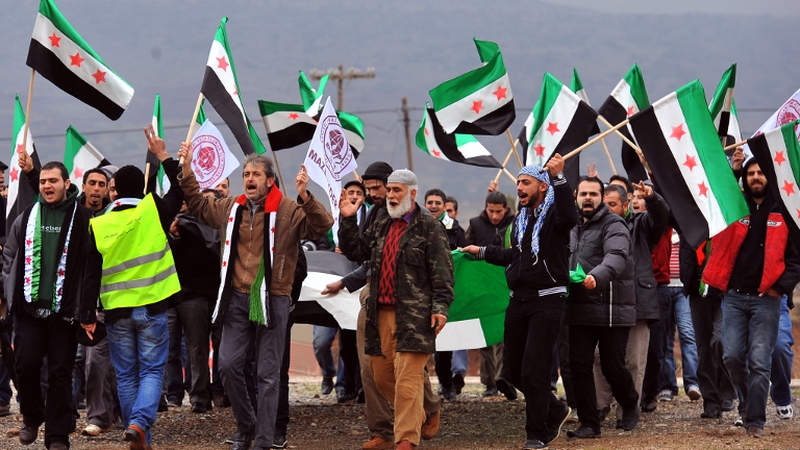 Syrian opposition gather at the Turkish-Syrian border city of Kilis