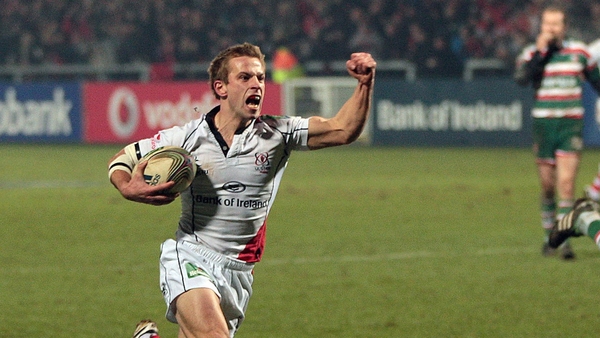 Paul Marshall runs up to score Ulster's fourth try and raises his fist in celebration