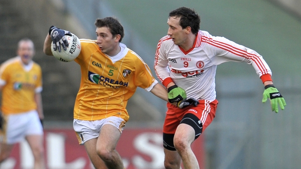 Tyrone edged out Antrim with Stephen O'Neill's goal a telling score