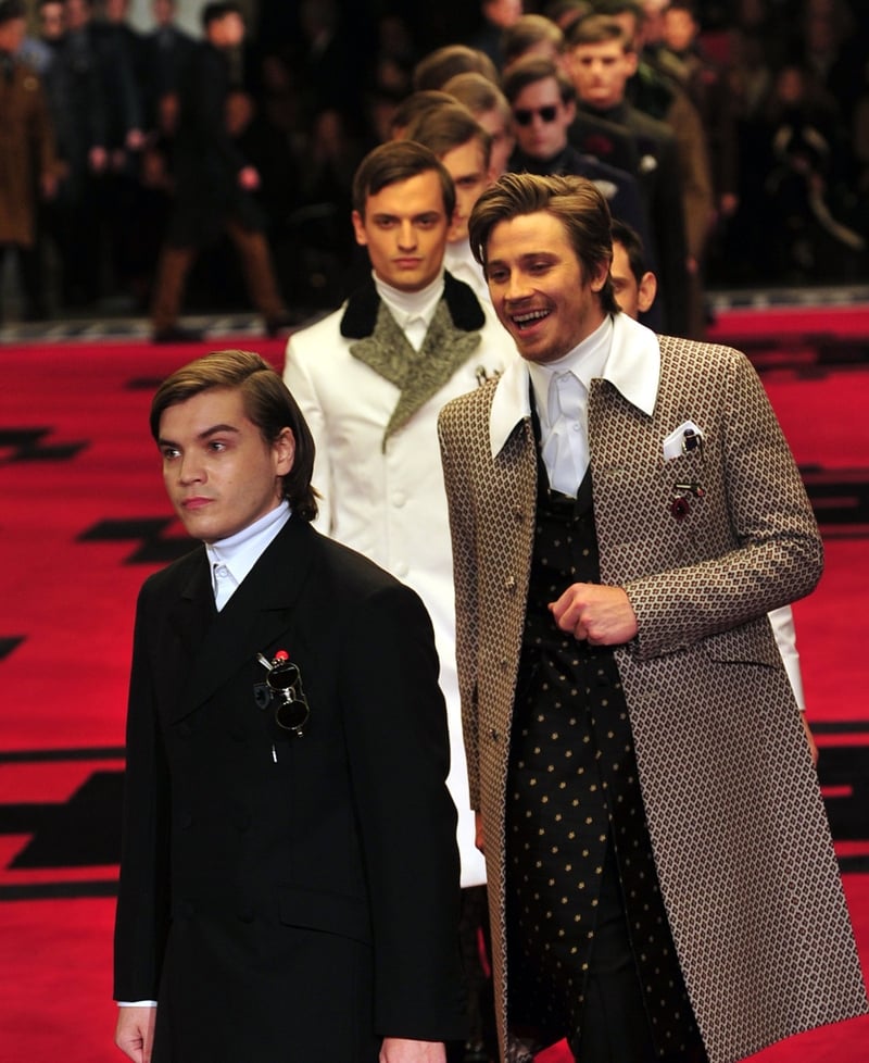 Actors lead a line-up of models down the Prada runway