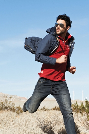 Duffle jacket €73, shirt €79, jeans €59, desert boots, €60, sunglasses €17