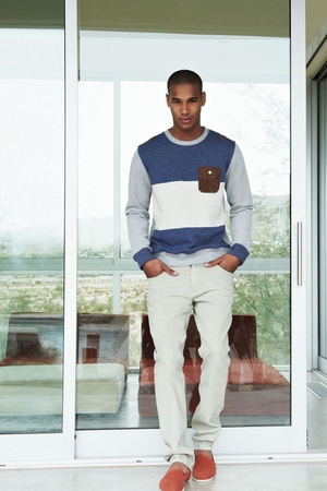 Sweater €42, trousers €53, shoes €23