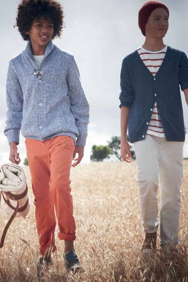 Shawl cardigan €24, chinos €19, desert boots €32, beanie €6, blue cardigan and t-shirt set €27, chinos €15, tan shoes €16