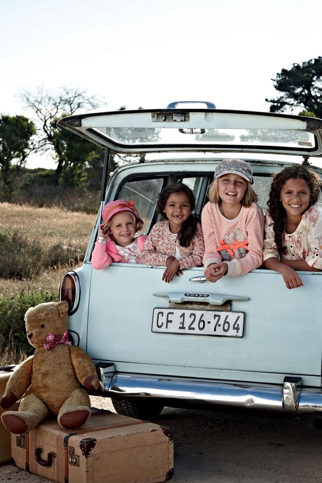 Star hat €8.50, floral top (2) from €12, zip-through from €16, cardigan from €16, cap €8, shoe sweater from €17, ruffle blouse €12