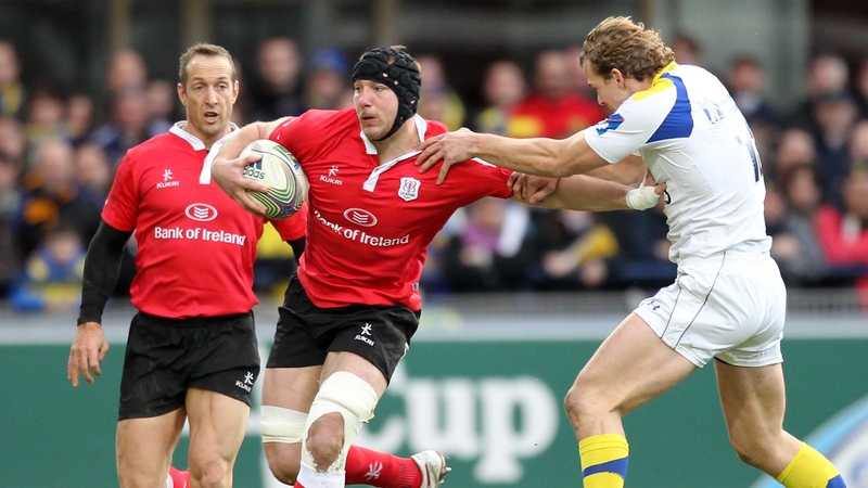 Stephen Ferris of Ulster is restrained by Clermont's Aurelien Rougerie